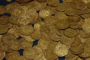 This hoard of ancient gold coins was probably buried by a British nobleman during a time of war. He would have intended to return and retrieve his wealth when hostilities were over.